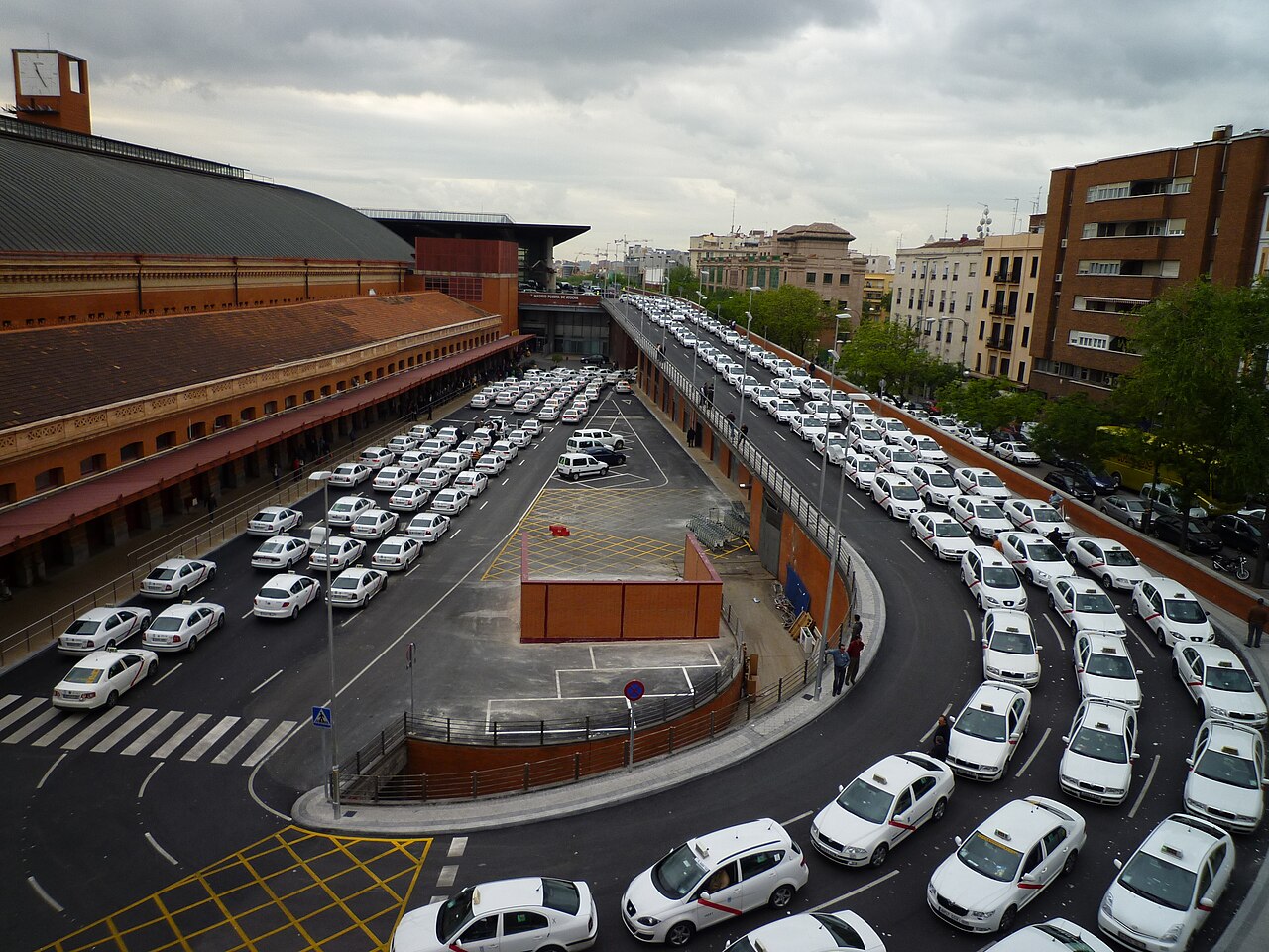 Taxis in a World Full of Car Sharing Services