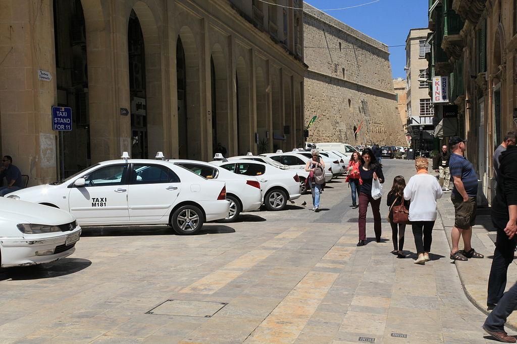 Why Malta's Traditional White Taxis Are Part of the Island Experience